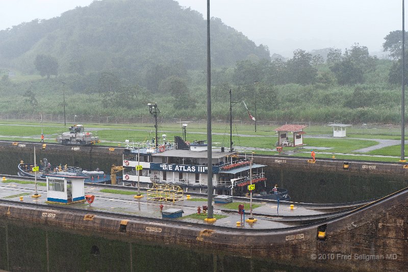 20101202_141337 D3.jpg - Miraflores Locks, Panama Canal.  At this lock, for example, this ship (going from Atlantic to Pacific) is being lowered 27 feet (see water mark).  Miraflores has 2 locks, each with a delta of 27 feet.